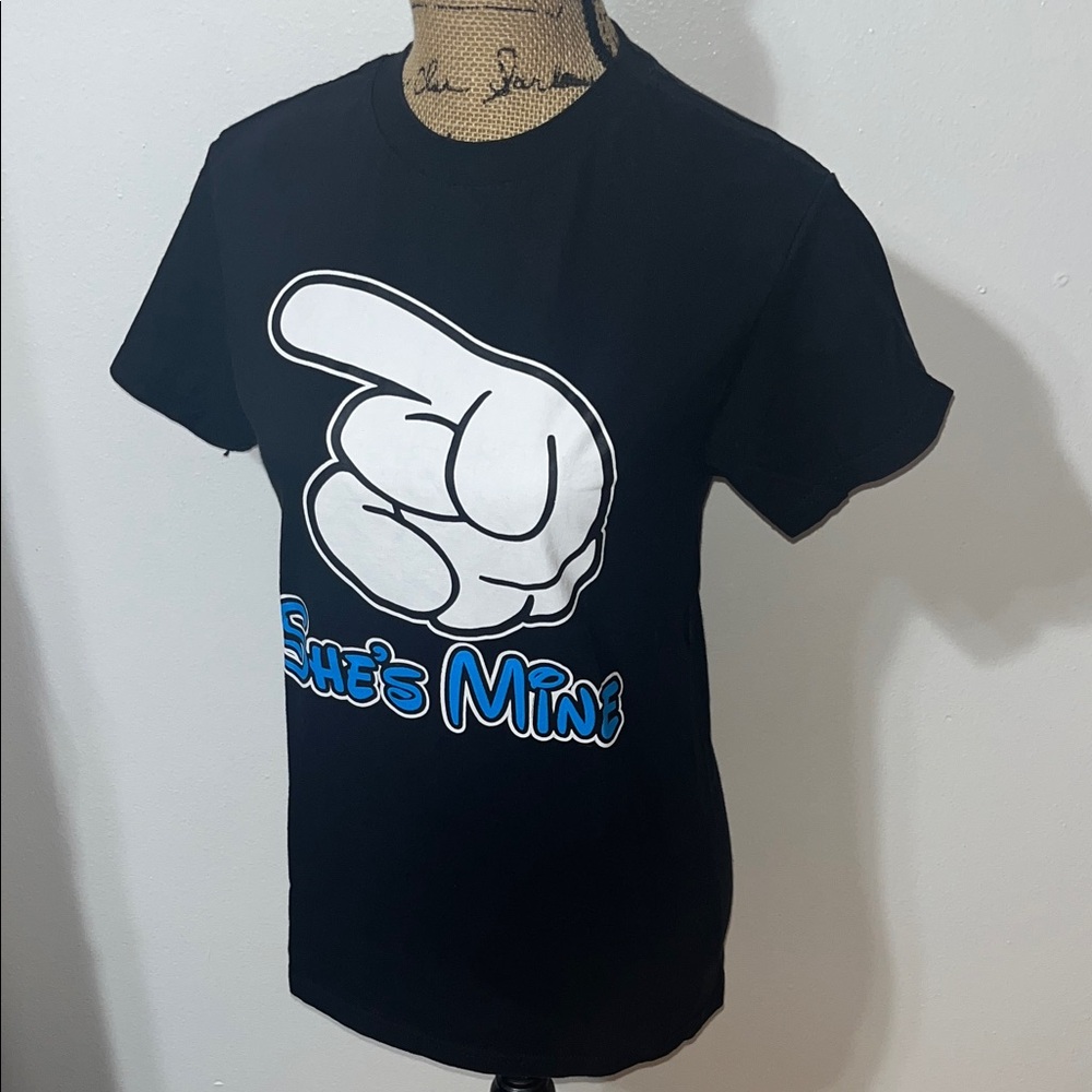 Black Graphic Tee with White Pointing Hand and Blue Text
